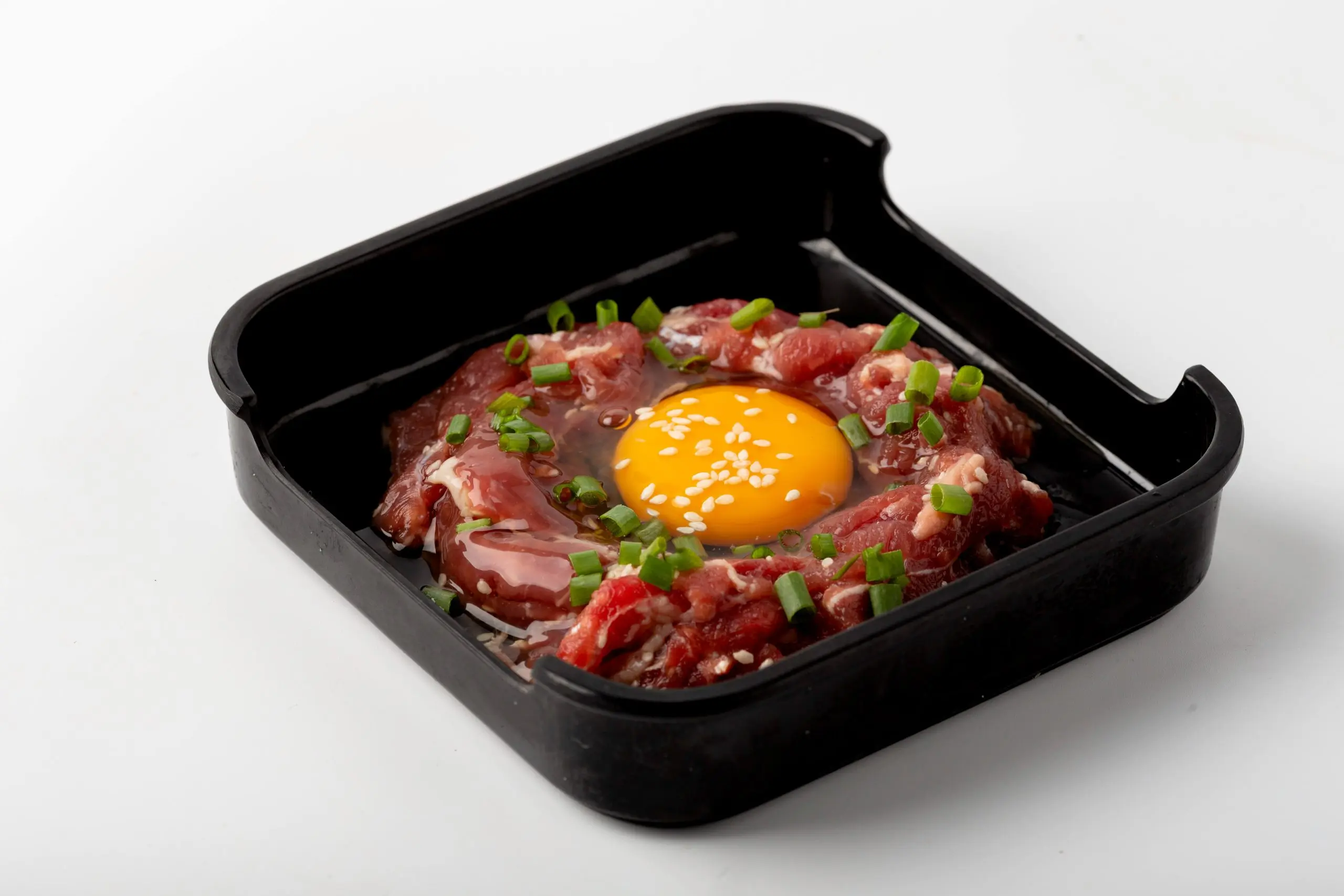 Marinated beef with egg yolk and sesame at M Bar Hot Pot Restaurant in Arcadia